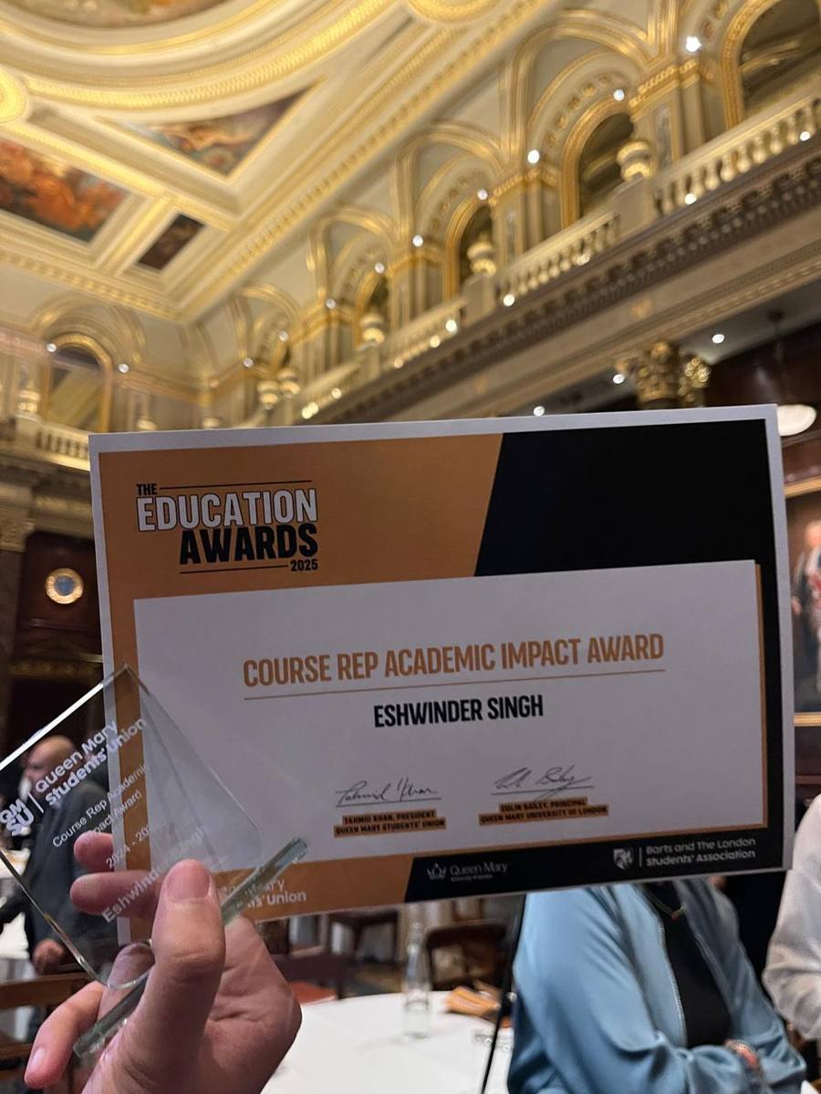 Eshwinder holding the Course Rep Academic Impact Award trophy and certificate at the Education Awards 2025